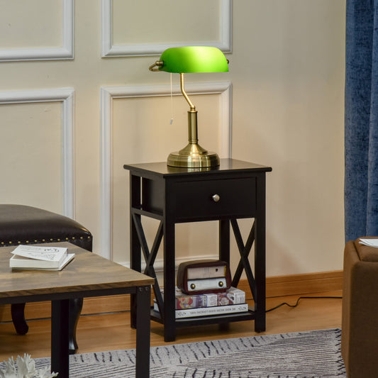 The table lamp placed on a black bedside table in a living room setting