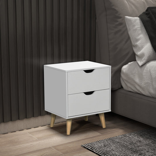 the white storage cabinet with two drawers placed next to a bed