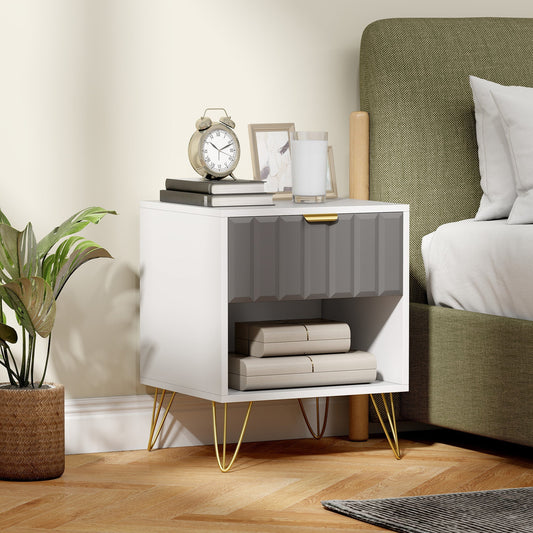 The modern bedside cabinet in a bedroom setting next to a bed