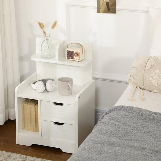 Small bedside cabinet with two drawers and a shelf, placed next to a bed