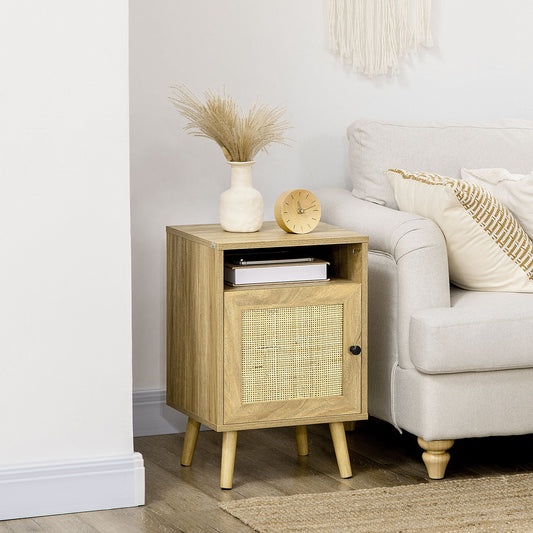 The bedside table with rattan element in a bedroom setting next to a sofa