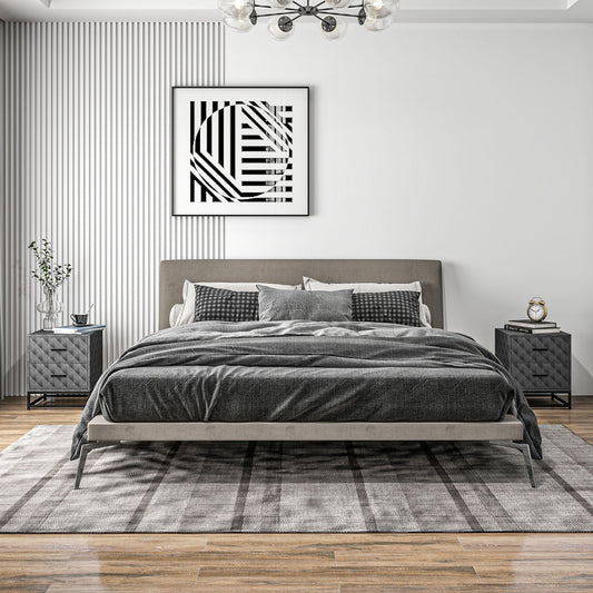 Two grey bedside cabinets with geometric pattern in a modern bedroom setting