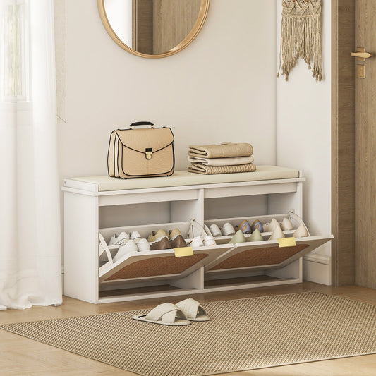 The shoe storage bench with padded seat is placed in a hallway with shoes and a handbag