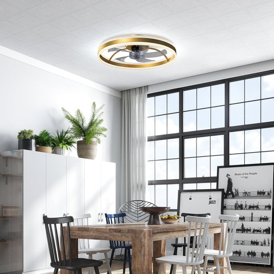 the gold-tone ceiling light with fan installed in a dining room setting