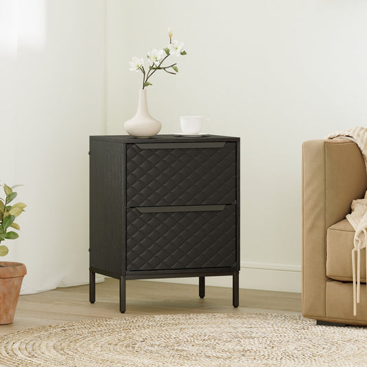 The chest of drawers in a bedroom setting next to a sofa and a rug