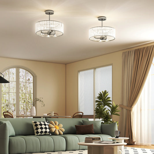 The ceiling lights installed in a modern living room with a green sofa