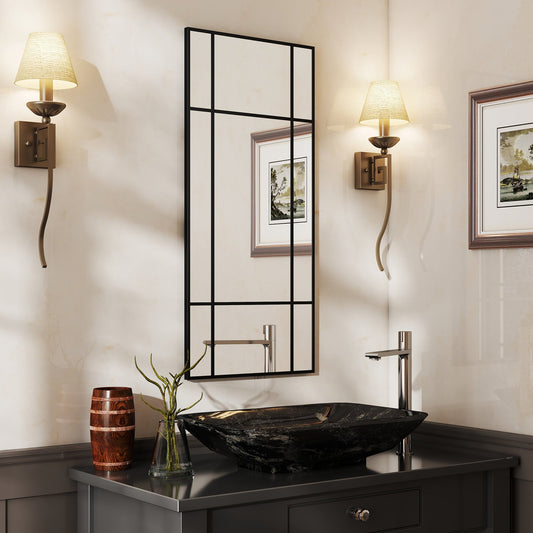 The decorative grid wall mirror is hung above a sink in a bathroom setting
