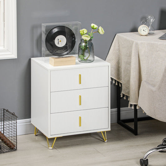 The chest of drawers placed in a room next to a desk with a vinyl record and flowers on top