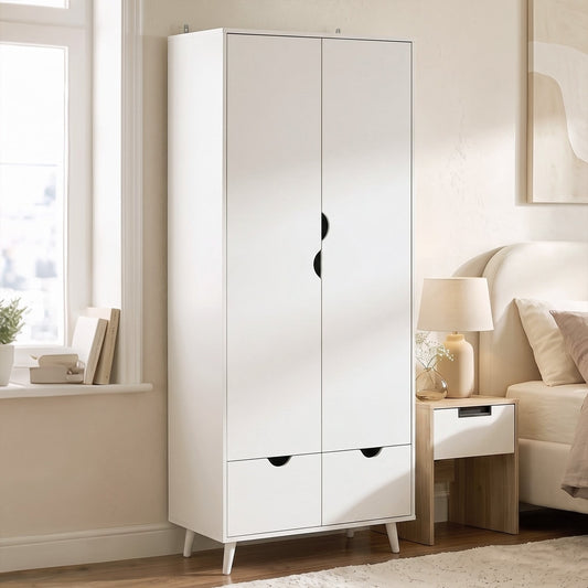 The white clothes wardrobe placed in a bright bedroom next to a bed and bedside table