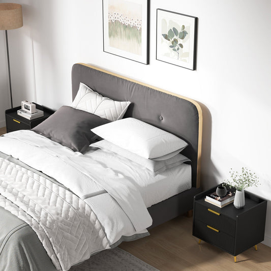 The bedside tables placed on both sides of a double bed in a modern bedroom setting