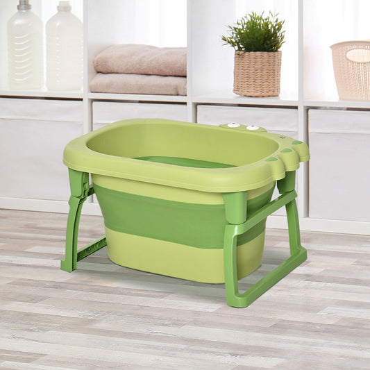 Green foldable baby bathtub with stool set up in a bathroom setting