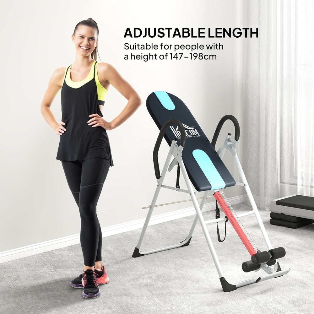 Woman standing next to the gravity inversion table with adjustable length highlighted