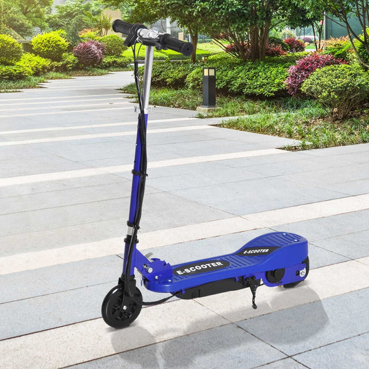 The blue kids electric scooter is parked on a paved path outdoors with green bushes behind it