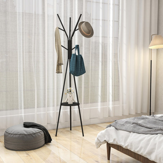 The coat rack stand is shown in a bedroom setting with a hat and bag hanging on it