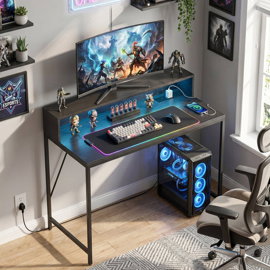 the office desk set up in a room with a computer monitor keyboard and gaming accessories