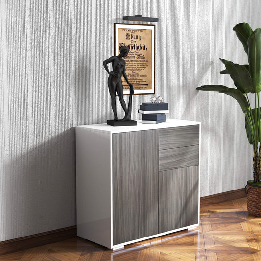 The grey and white storage cabinet is styled in a living room with a plant and artwork