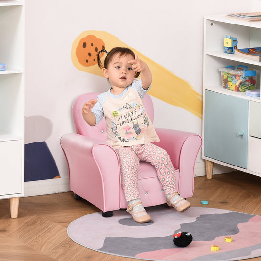 A young girl sitting on the pink toddler chair in a playroom setting