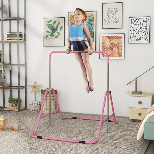 A young girl doing a handstand on the pink kids horizontal bar in a bright room