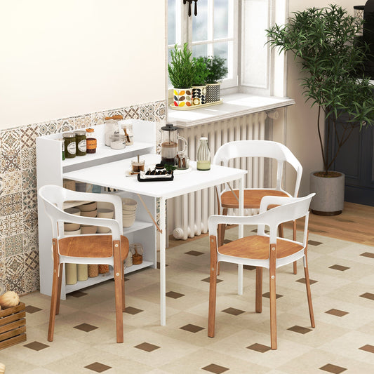 The dining furniture set in a kitchen with four chairs around the table