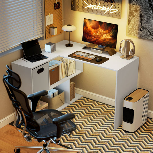 The office desk set up in a corner with a computer monitor and office chair in a home study