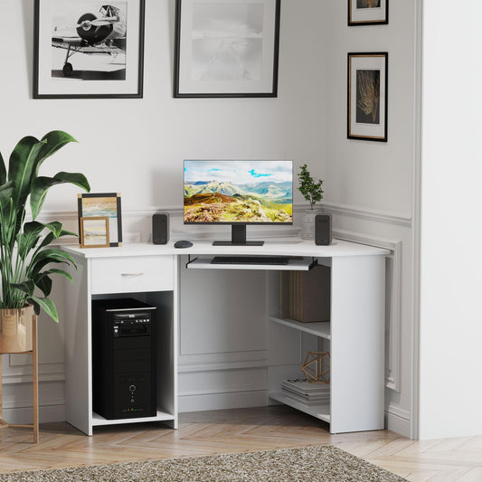 The corner desk set up in a home office with a computer, speakers and a tower unit underneath