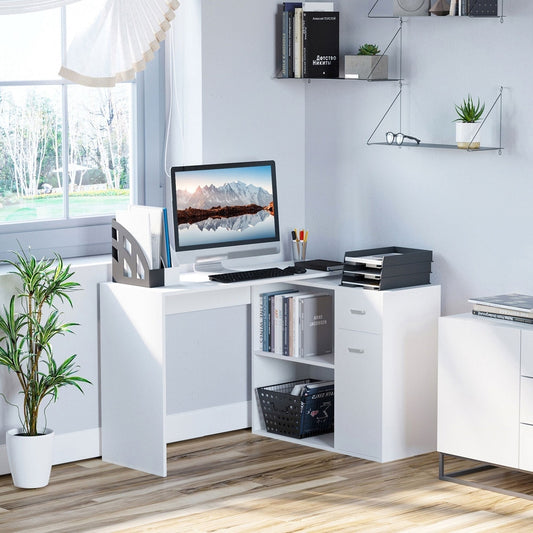 The corner computer desk set up in a home office with a computer and books