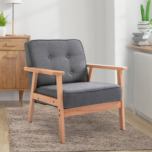The wooden frame accent chair in a living room setting on a rug