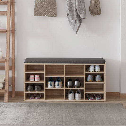 The shoe storage bench with a cushioned top is shown in a hallway with shoes on the shelves