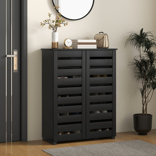 The black shoe storage cabinet placed in a hallway next to a door and mirror