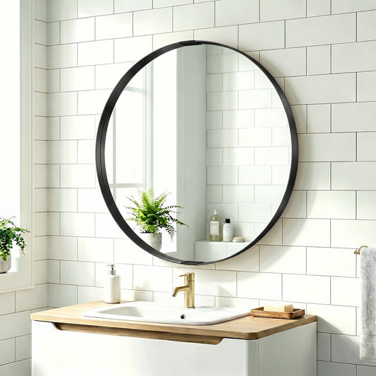 The wall mirror mounted above a bathroom sink with white tiled walls and a wooden vanity unit
