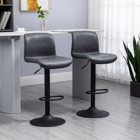 Two dark grey PU leather bar stools with backrests and footrests in a modern kitchen setting