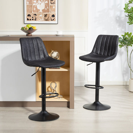 The tub bar stools placed in a modern kitchen setting next to a wooden breakfast bar