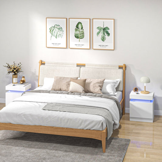 Two white bedside tables with integrated LED lights in a bedroom setting