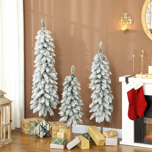 The artificial Christmas trees displayed in a living room with wrapped gifts around the base