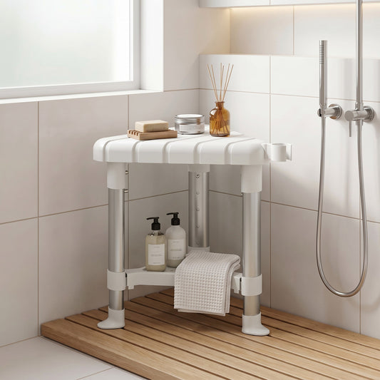 The shower stool placed in a tiled corner with toiletries and a towel on the storage shelf