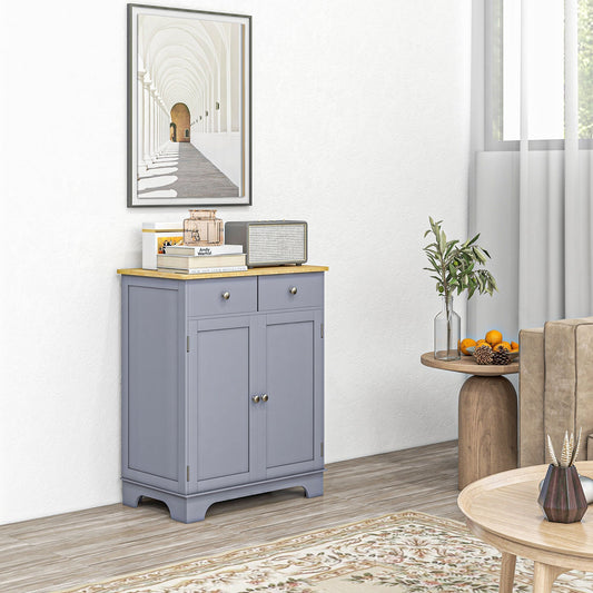 The grey storage cabinet with a wood top placed in a living room setting next to a sofa