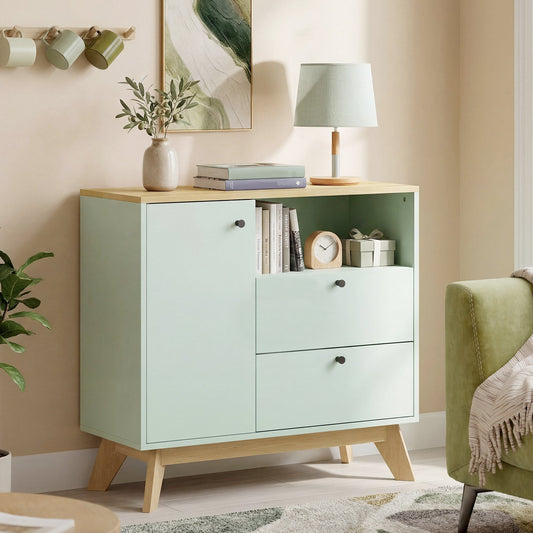 The storage cabinet styled in a living room with books and a lamp on top