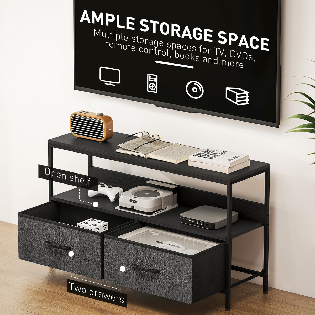 The black TV unit with its two drawers open, showing ample storage space