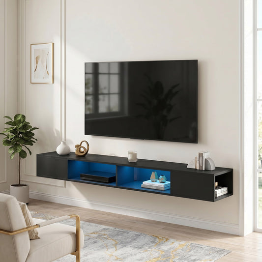 The wall mounted TV unit installed in a living room below a television with blue light glowing