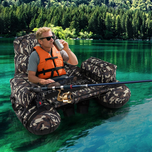 Man drinking from a bottle while sitting in the inflatable fishing float tube on a lake
