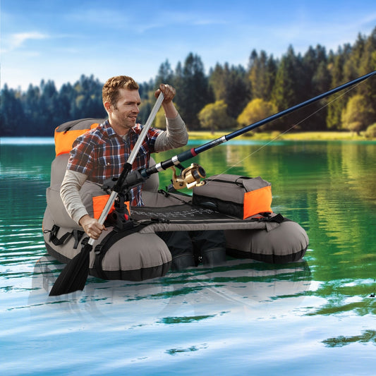 Man using the inflatable fishing float tube on a lake, holding a fishing rod