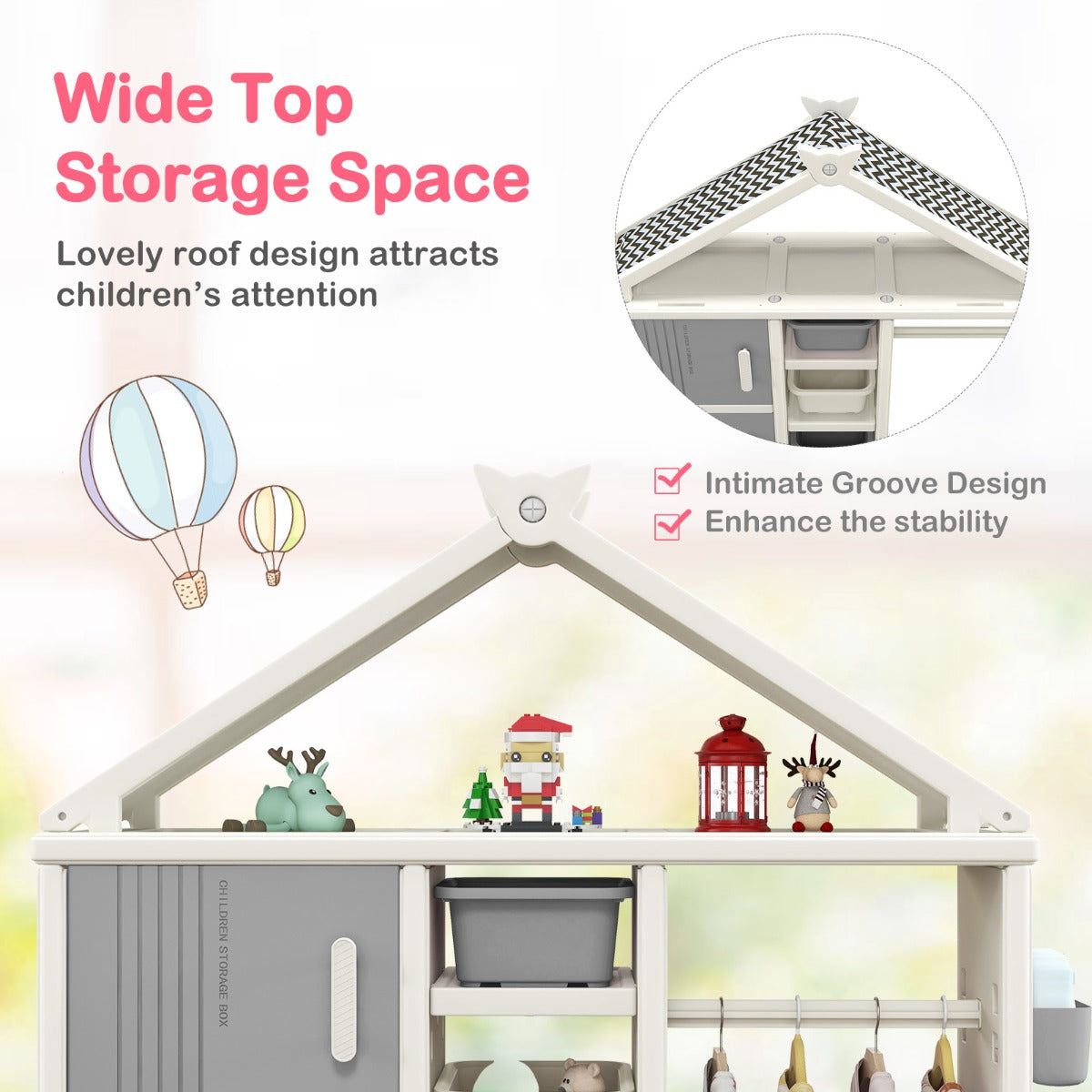 The top of the kids storage unit with a decorative roof and small items displayed