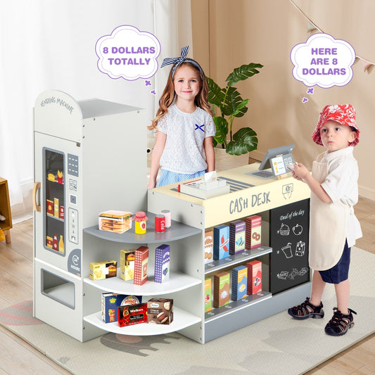 The play kitchen set with two children interacting with the cash desk and vending machine