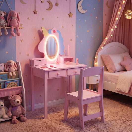 Pink dressing table with unicorn mirror in a child's bedroom