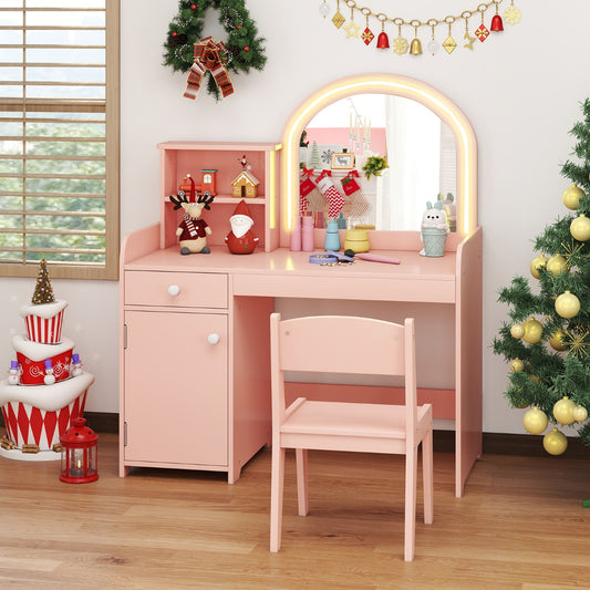 The kids vanity set decorated for Christmas in a festive living room setting