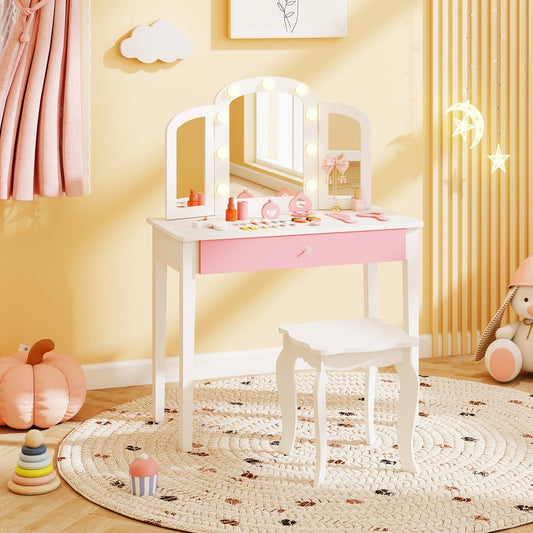 The dressing table with mirror and lights set up in a child's bedroom with toys and a rug