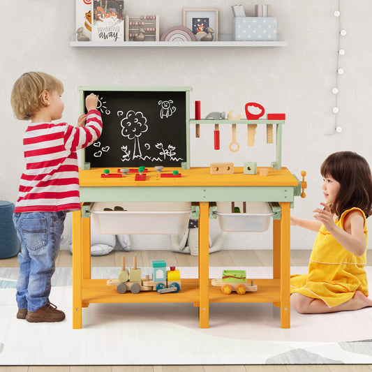 The play kitchen set being used by a boy drawing on the blackboard and a girl sitting beside it