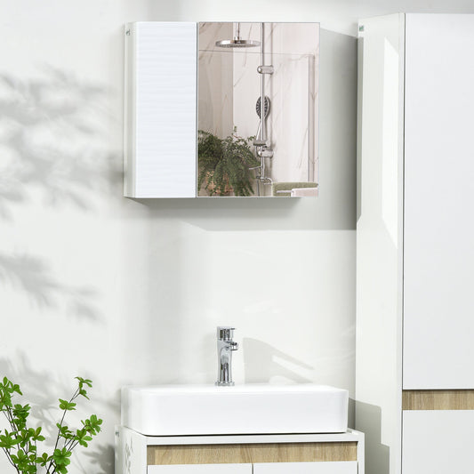 The bathroom mirror mounted on a wall above a washbasin in a bright room