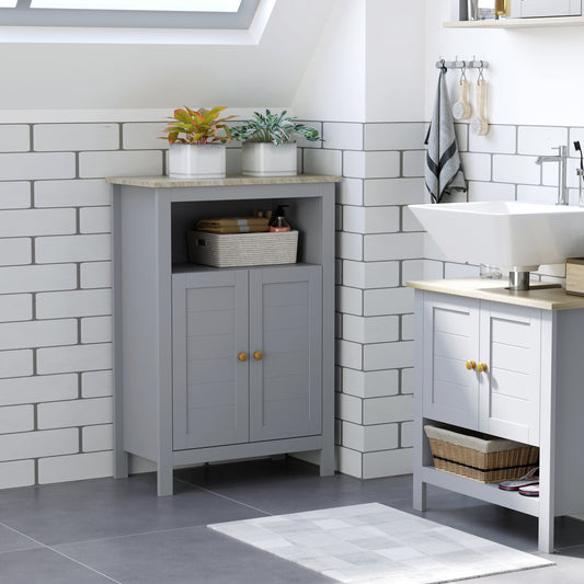 the bathroom cabinet placed in a corner next to a sink unit in a tiled room