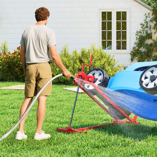 A red riding mower lift jack is used to tilt a blue ride-on mower for cleaning